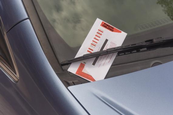 parking ticket on car