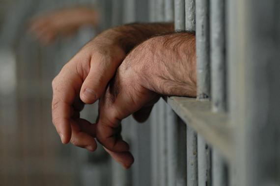 prisoners_rights_man_behind_bars_3.jpg